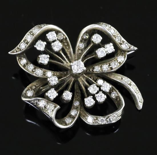 An 18ct white gold and diamond flower form quatrefoil brooch of openwork form, 33mm.